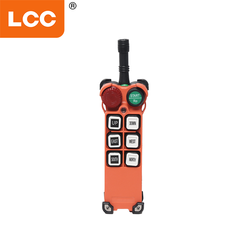 Crane remote control unit highlighting emergency stop layout